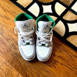Grey green and white JORDANS.